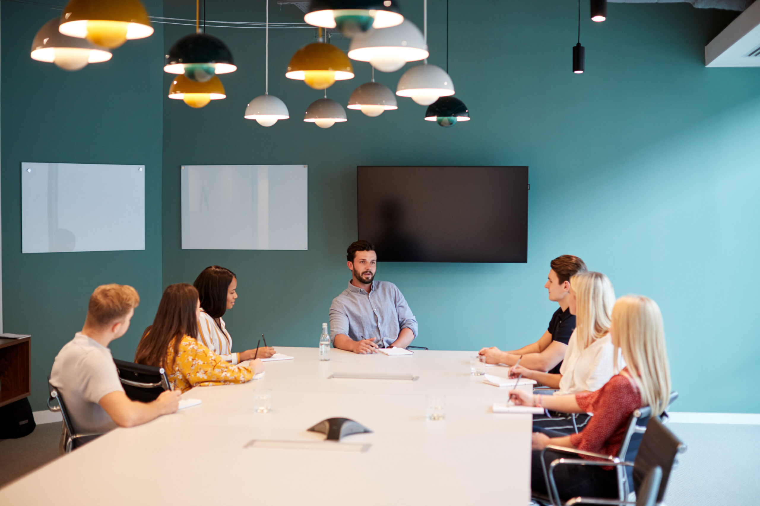 meeting of newly hired people with entry level marketing jobs