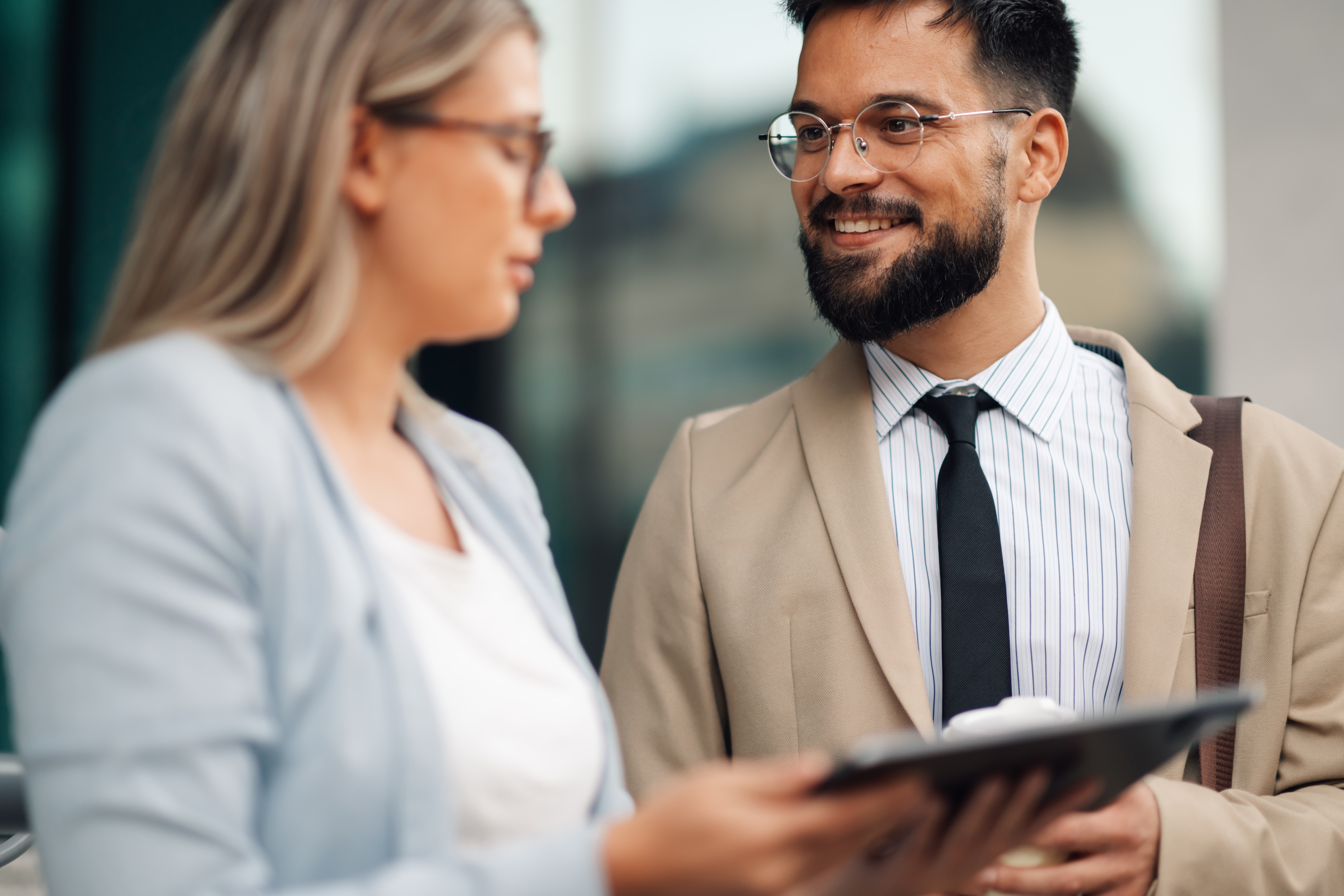 Sales professional having a product presentation to a female customer.