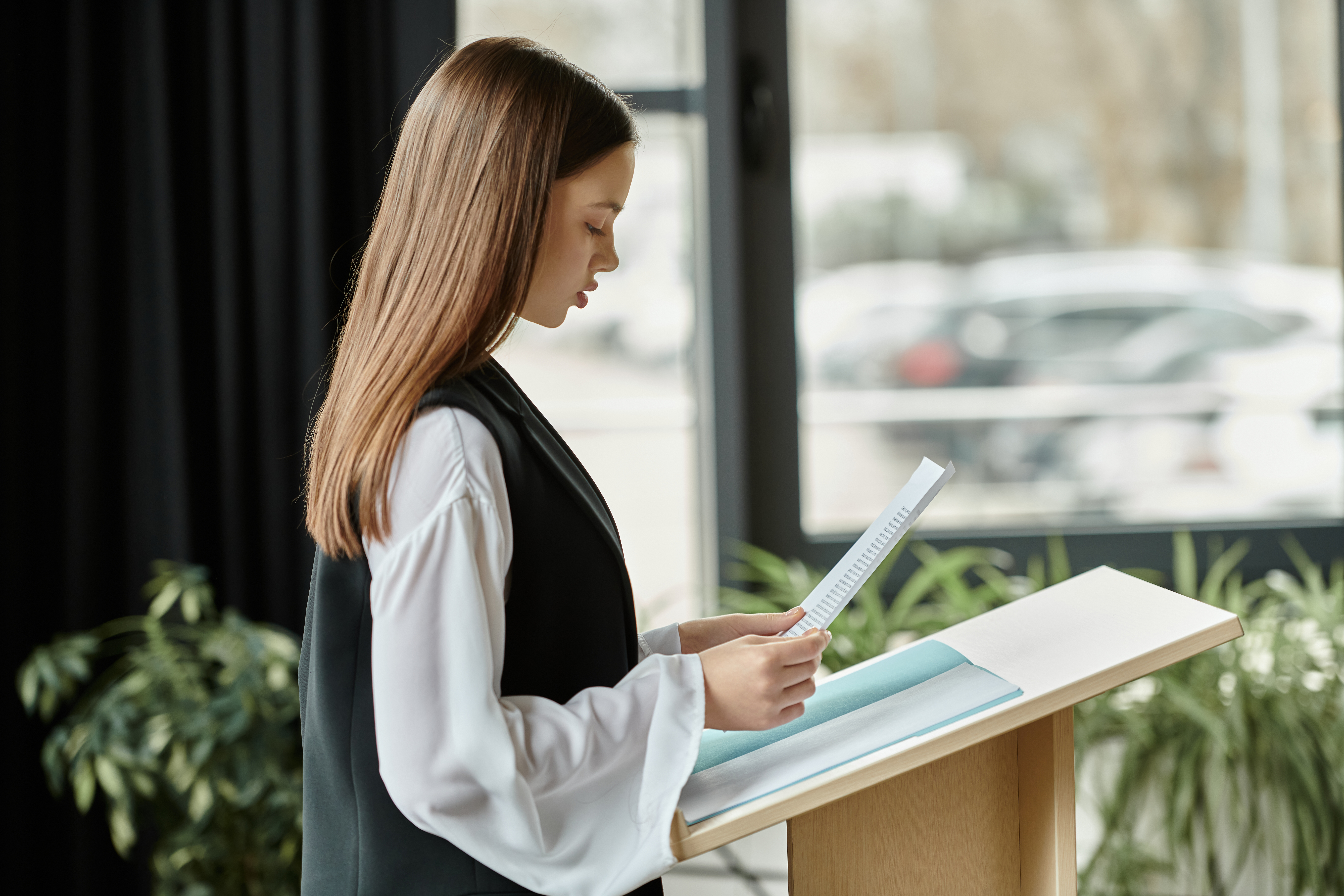 Young sales professional practicing body language in sales.