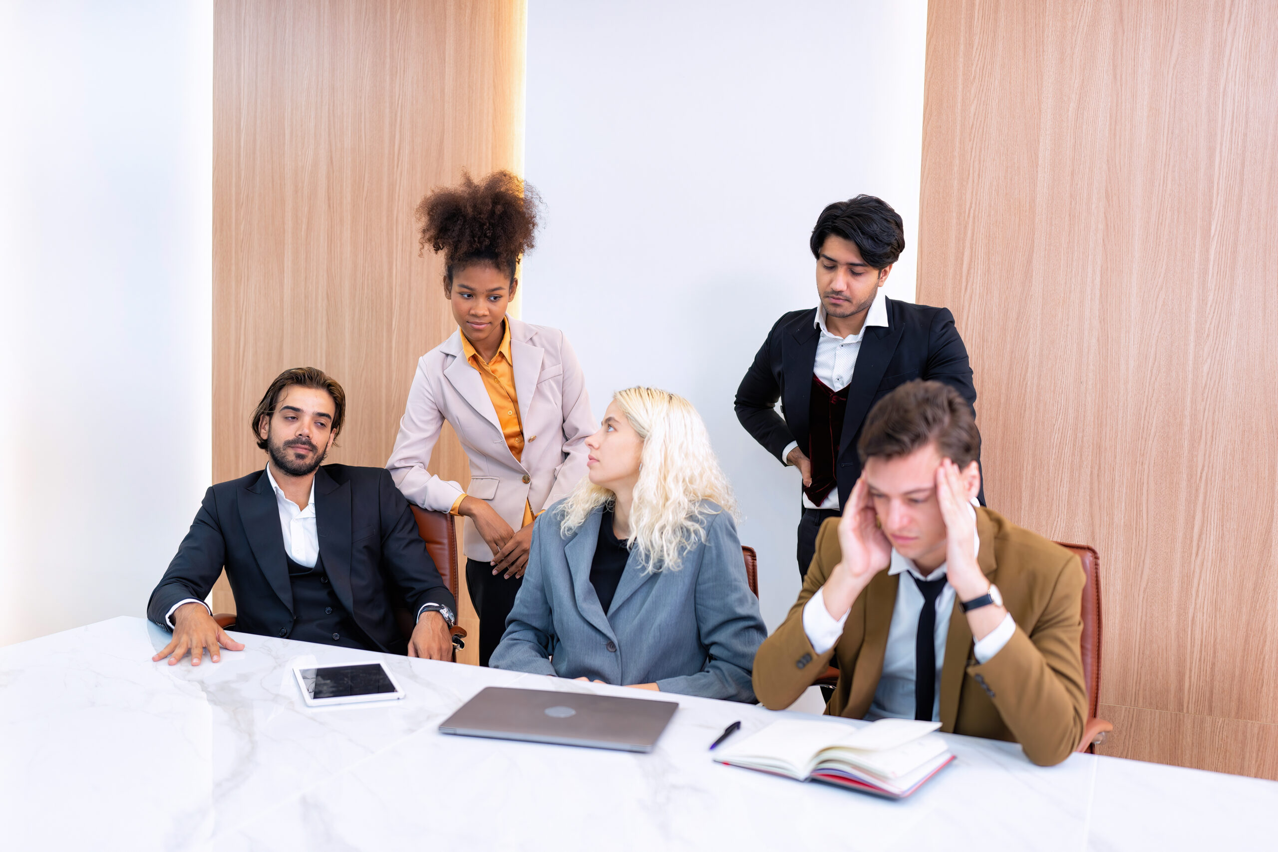 Business leaders having a meeting about customer churn.