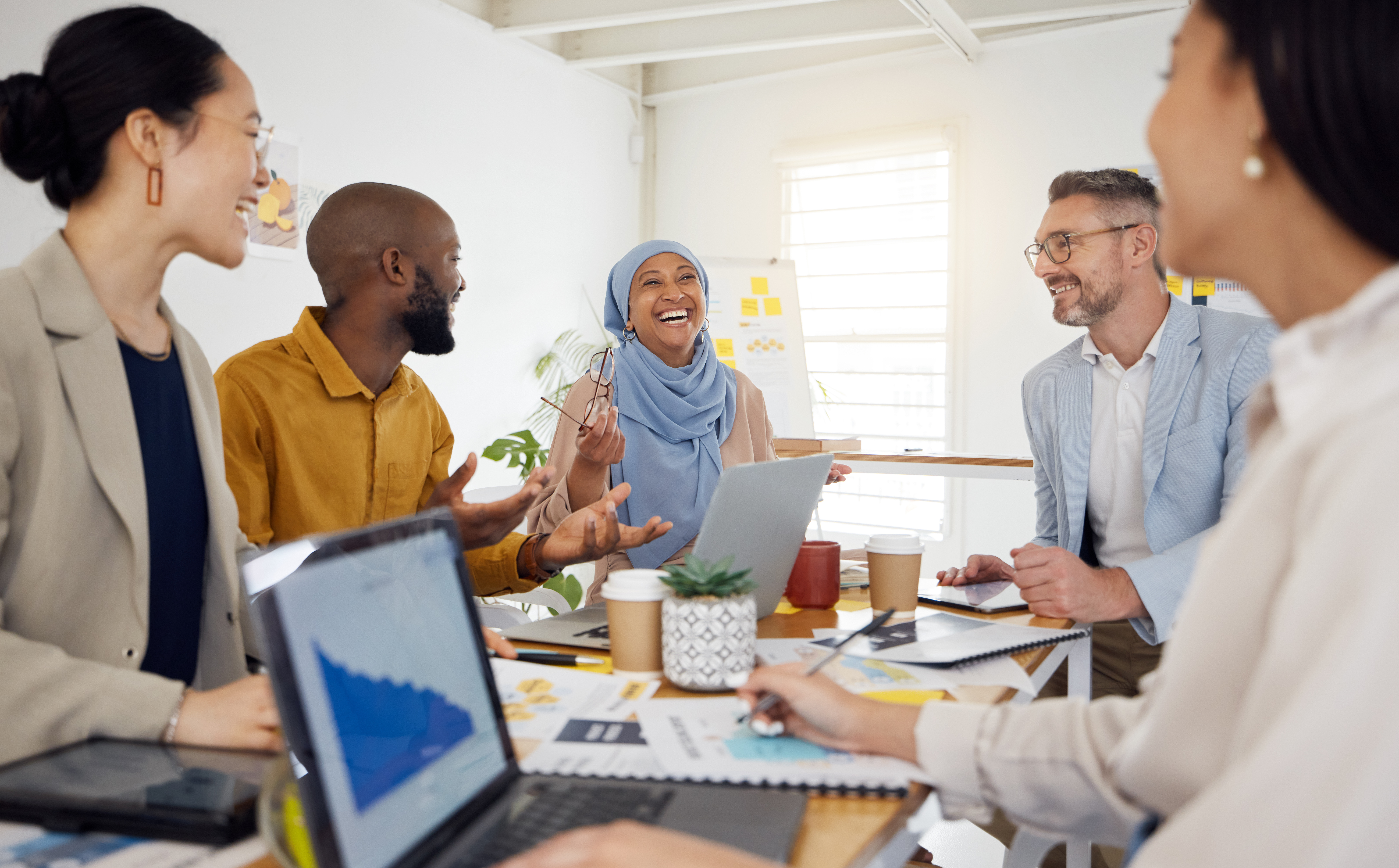 A group of employees with great workplace skills, working together.